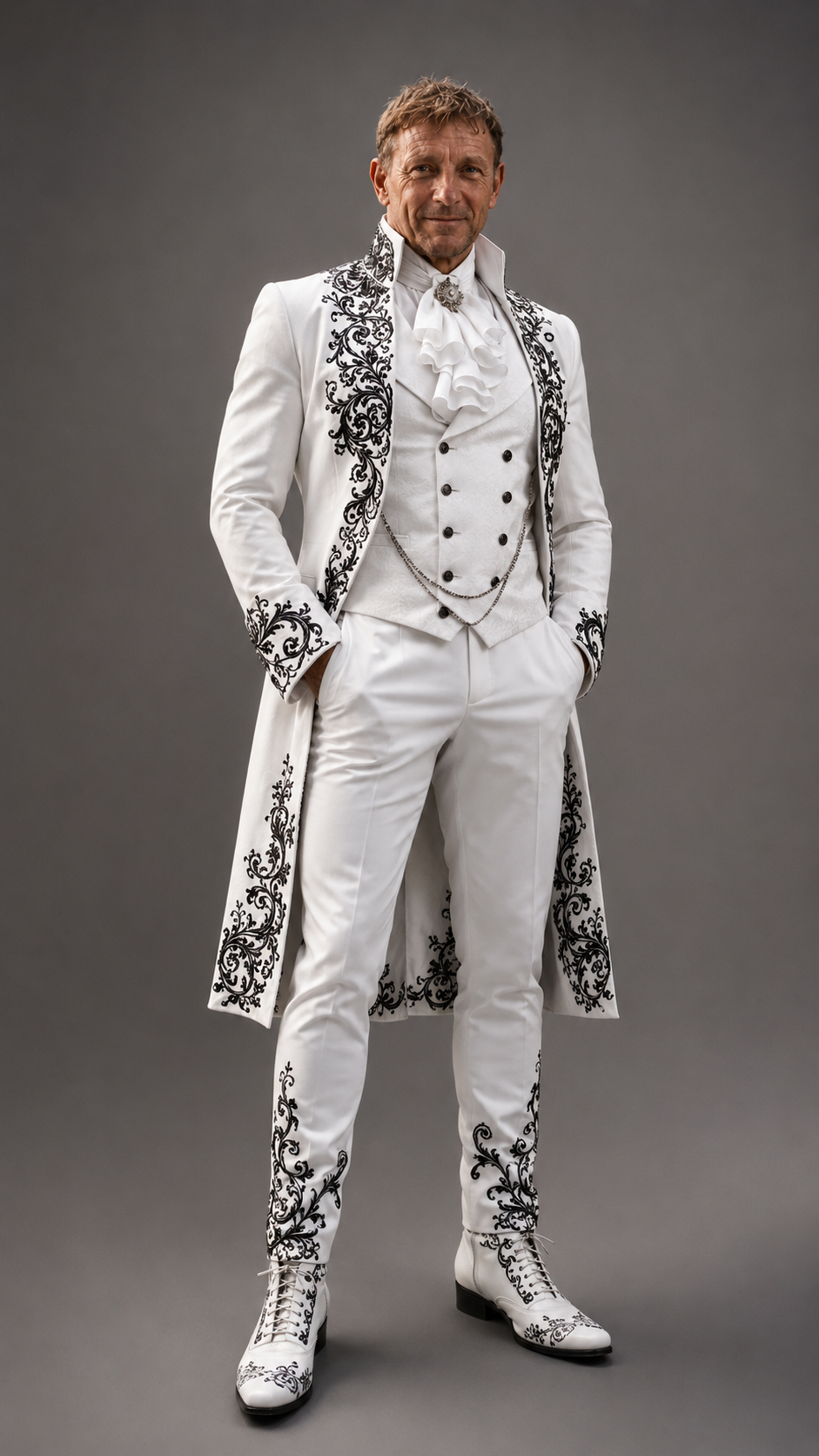 Use the uploaded image as the face reference. Preserve exact facial features, hair color, hairstyle, beard and mustache (if present), skin tone, expression, and identity. Do not alter the face in any way.

Full body portrait of a man standing confidently against a plain seamless gray studio background. He wears an elegant all-white formal ensemble: high stiff white collar with white ruffled cravat and ornate silver brooch, fitted white waistcoat with black buttons and silver pocket chain, long white tailcoat with elaborate intricate black baroque floral scroll embroidery on lapels, cuffs, edges, front panels and hem, matching slim white trousers with black embroidery on the lower legs, white lace-up boots with black embroidered details.

Pose: standing confidently, intense gaze looking at the camera. Highly detailed realistic fashion photography, sharp focus, elegant lighting, vertical 9:16, 8K, Hasselblad X2D 100C, 85mm lens, f/2.8, studio lighting with softboxes and rim light.

Negative prompt: changed face, loss of resemblance, over-retouching, plastic skin, blurry, bad anatomy, cartoon, anime, illustration, CGI, 3D render, text, watermark, logo, unnatural colors.